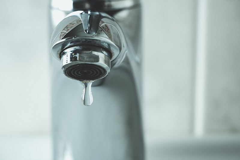 water drop dripping from the tap and water shortage water tile water faucet / Getty Images
