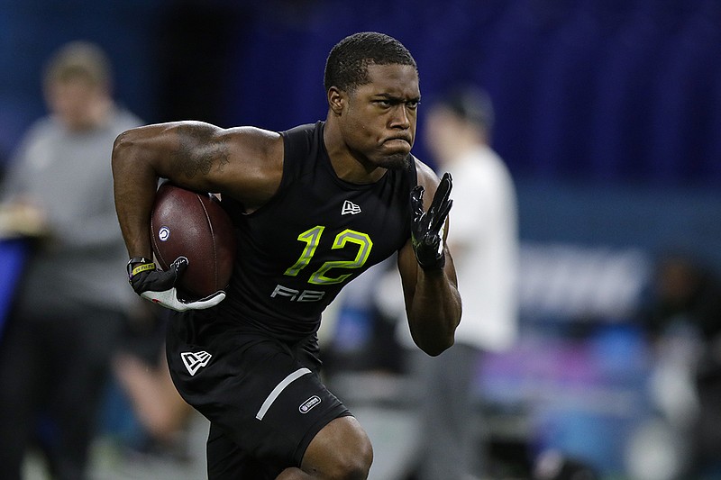 AP photo by Michael Conroy / Appalachian State running back Darrynton Evans runs a drill at the NFL scouting combine on Feb. 28 in Indianapolis. Evans was drafted in the third round by the Tennessee Titans and signed with the team Wednesday.