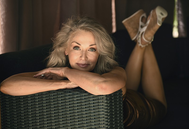 Model Kathy Jacobs poses for a portrait at her home in Calabasas, Calif. on Friday, July 17, 2020. Jacobs has made her Sports Illustrated swimsuit issue debut at age 56. The 2020 Sports Illustrated Swimsuit issue is online and on newsstands Tuesday. (AP Photo/Chris Pizzello)


