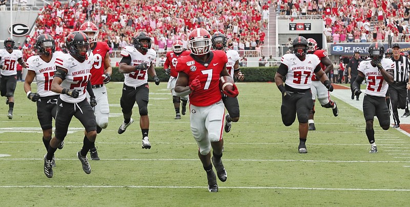 AP photo by Bob Andres / Georgia running back D'Andre Swift finishes his run to the end zone for a touchdown catch against Arkansas State on Sept. 14, 2019, in Athens, Ga.