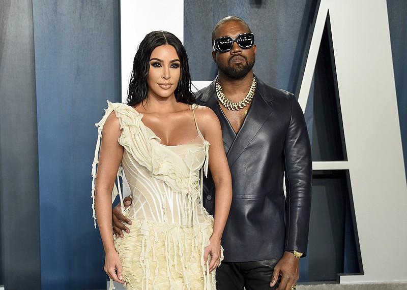 FILE -Kim Kardashian West, left, and Kanye West arrive at the Vanity Fair Oscar Party in Beverly Hills, Calif. on Feb. 9, 2020. Kardashian West is asking the public to show compassion and empathy to husband Kanye West, who she says is bipolar and caused a stir this week after fulminating in a series of social media posts. The reality TV star posted a lengthy message Wednesday on her Instagram Live feed, explaining that life has been complicated for her family and West, who ranted against historical figure Harriet Tubman and discussed abortion on Sunday while he declared himself a presidential candidate. (Photo by Evan Agostini/Invision/AP, File)


