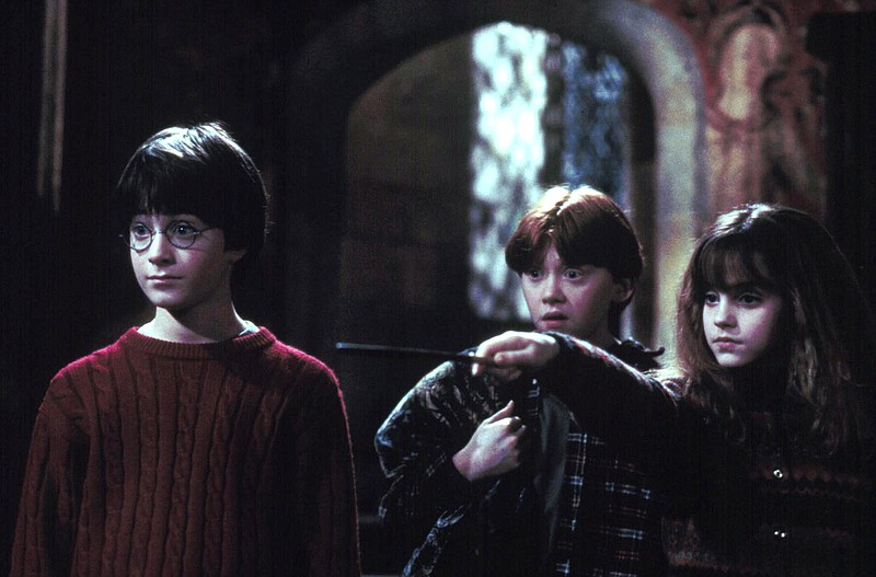 From left, Daniel Radcliffe as Harry Potter, Rupert Grint as Ron Weasley and Emma Watson as Hermione Grainger in the Warner Brothers picture, "Harry Potter and the Sorcerer's Stone." (SHNS file photo by Peter Mountain / Warner Brothers)