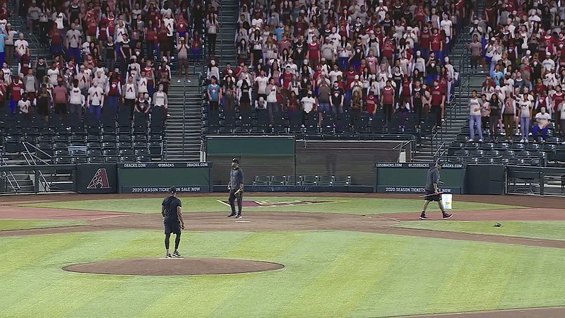 Fox Sports photo via AP / This image provided by Fox Sports shows a video screenshot from a test of the virtual crowds at the Arizona Diamondbacks' Chase Field in Phoenix in early July 2020.