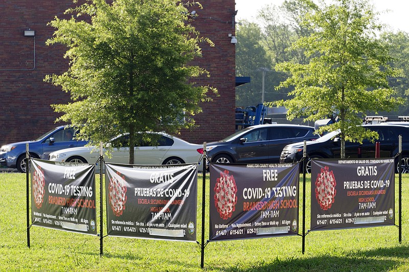 Staff photo by C.B. Schmelter / Vehicles wait in line for COVID-19 testing at Brainerd High School on Monday, July 20, 2020 in Chattanooga, Tenn.