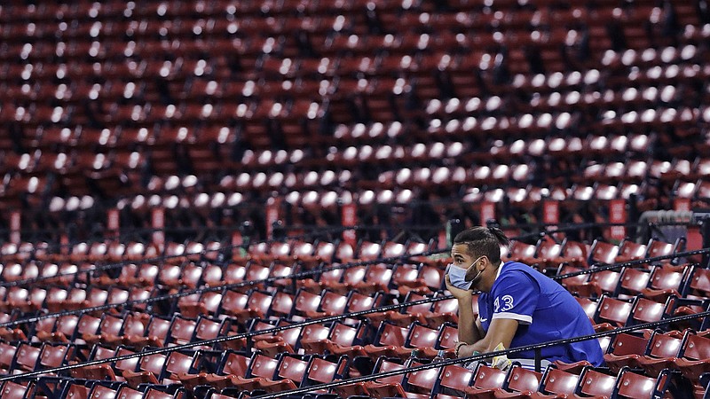 AP photo by Charles Krupa / Toronto Blue Jays outfielder Lourdes Gurriel Jr. watches from the empty stands in Fenway Park during Tuesday's exhibition game against the host Boston Red Sox.