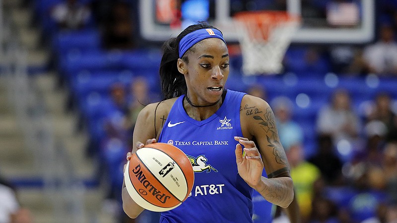 AP photo by Tony Gutierrez / Glory Johnson, shown playing for the Dallas Wings during a home game against the Los Angeles Sparks on Aug. 14, 2019, is now with the Atlanta Dream but won't be able to play in Sunday's season opener after testing positive for the coronavirus.