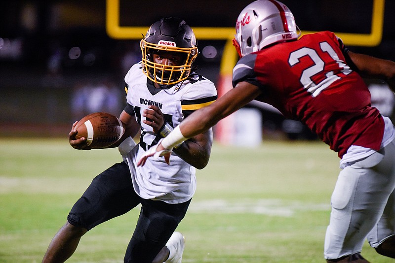 File photo by Cade Deakin / McMinn County running back Jalen Hunt, with ball, accumulated more than 2,000 all-purpose yards and had four interceptions as a junior last season to help the Cherokees go 9-2 overall and finish second in Region 2-6A behind perennial state power Maryville.