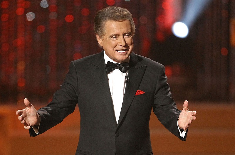 FILE - In this June 27, 2010 file photo, host Regis Philbin is seen on stage at the 37th Annual Daytime Emmy Awards in Las Vegas. Philbin, the genial host who shared his life with television viewers over morning coffee for decades and helped himself and some fans strike it rich with the game show "Who Wants to Be a Millionaire," has died on Friday, July 24, 2020. (AP Photo/Eric Jamison)


