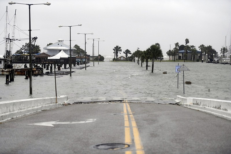 Peoples Street begins to flood during Hurricane Hanna, Saturday, July 25, 2020, in Corpus Christi, Texas. (Annie Rice/Corpus Christi Caller-Times via AP)