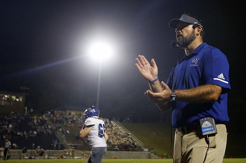 Staff photo by C.B. Schmelter/ Red Bank coach Chris Brown claps during their game against Soddy-Daisy at Soddy-Daisy High School's Robert Talaska Field on Friday, Aug. 23, 2019 in Soddy-Daisy, Tenn.