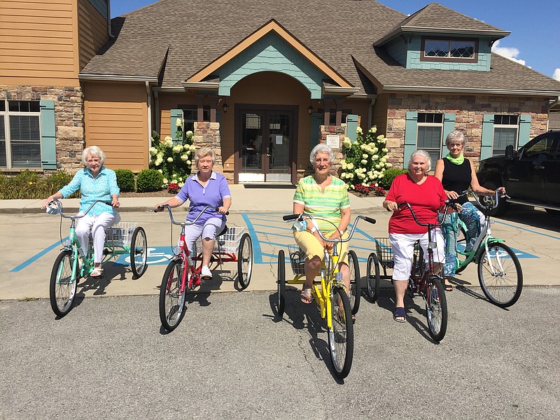 Women in a Collegedale condominium community have started a bike club for daily exercise rides. They are, from left, Mona Trotter, Judy Allen, Estelle Harris, Margaret Whittle and Elsie Keet. Staff photo by Mark Kennedy.