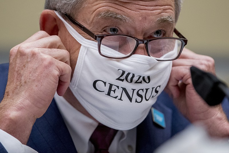 Census Bureau Director Steven Dillingham wears a mask with the words "2020 Census" as he arrives to testify before a House Committee on Oversight and Reform hearing on the 2020 Census on Capitol Hill, Wednesday, July 29, 2020, in Washington. (AP Photo/Andrew Harnik)


