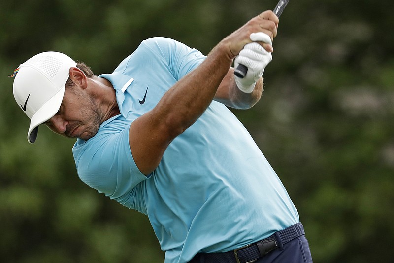 AP photo by Mark Humphrey / Brooks Koepka tees off on the 18th hole at TPC Southwind during the first round of the World Golf Championship-FedEx St. Jude Invitational on Thursday in Memphis.