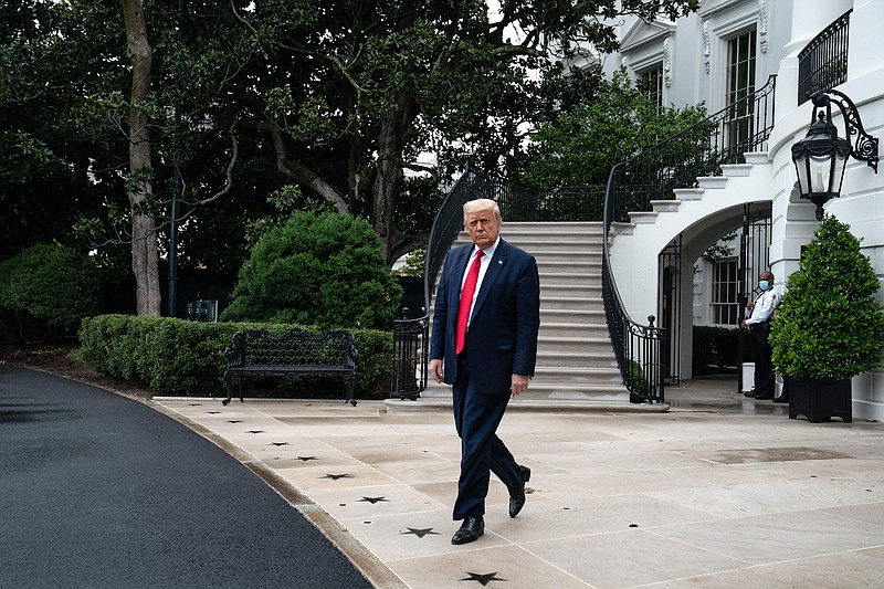 Photo by Anna Moneymaker of The New York Times / President Donald Trump walks to talk with reporters before departing the White House in Washington on Friday, July 31, 2020, for a trip to Florida.