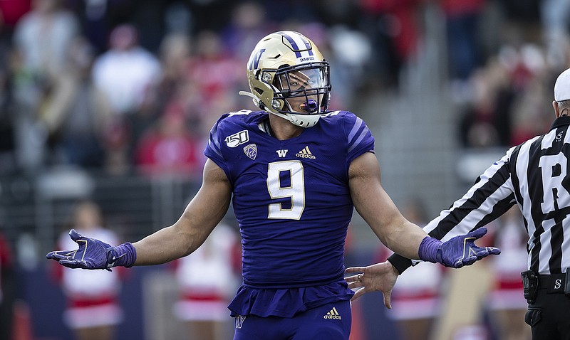 AP file photo by Stephen Brashear / Washington linebacker Joe Tryon is among the Pac-12 football players leading the charge to have a list of demands met in order to practice and play this season.