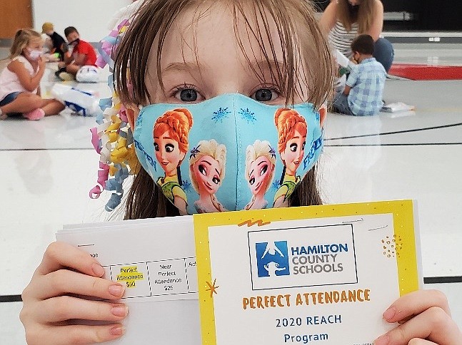 (Courtesy Photo) Izabella Balli, a third-grader at Middle Valley Elementary, shows her perfect attendance award for the summer program.