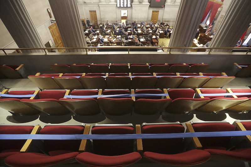 Seats in the gallery overlooking the House chamber are marked off due to the coronavirus pandemic during a House session Tuesday, June 9, 2020, in Nashville, Tenn. (AP Photo/Mark Humphrey)