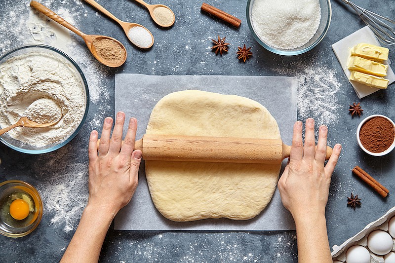 Dough bread, pizza or pie recipe traditional preparation. / Getty Images/iStock/wildpixel
