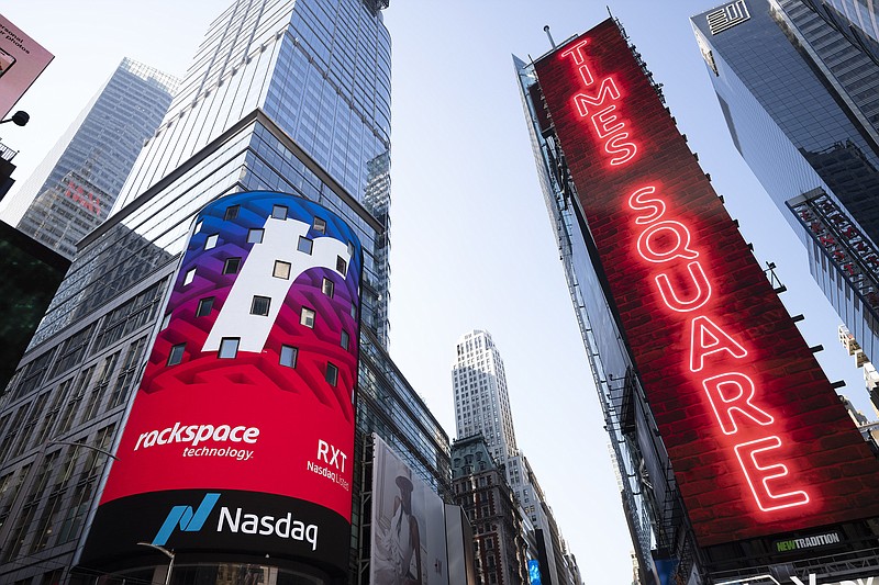 Cloud computing company Rackspace begins trading at the Nasdaq following its initial public offering, Wednesday, Aug. 5, 2020, in New York's Times Square. (AP Photo/Mark Lennihan)