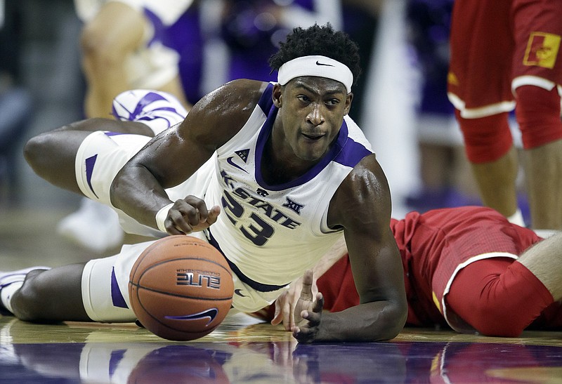 AP photo by Orlin Wagner / Kansas State forward Austin Trice dives for a loose ball during an exhibition game against Pittsburg State on Nov. 2, 2018, in Manhattan, Kan.
