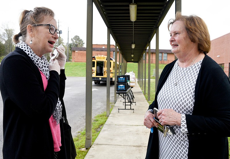 Staff Photo by Robin Rudd / From left, Dade County Superintendent of Schools, Dr. Jan Irons Harris talks with Dade County Board of Education Chair Carolyn Bradford.