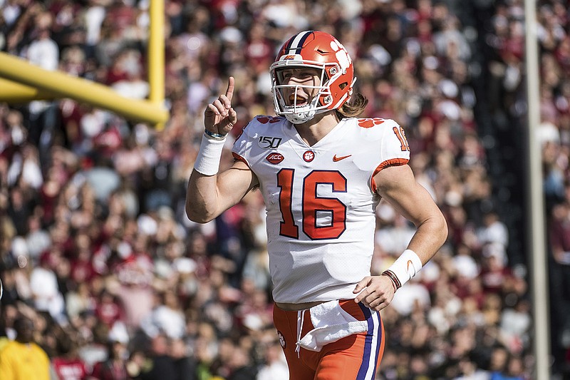 AP file photo by Sean Rayford / Clemson quarterback Trevor Lawrence will guide college football's preseason No. 1 team for a second consecutive year.