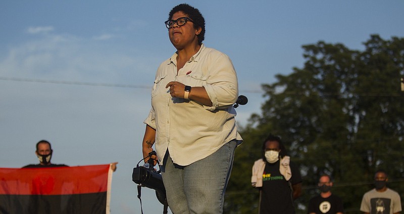 Staff photo by Troy Stolt / Chattanooga activist and city council candidate Marie Mott speaks during the Good Trouble Ride Protest in honor of John Lewis on Friday, Aug. 7, 2020 in Chattanooga, Tenn. The protest, which was organized by activists in Atlanta, Chattanooga, and Louisville, saw protesters from the group The People's Uprising ride from Atlanta, to Louisville, finally stopping at Chattanooga.