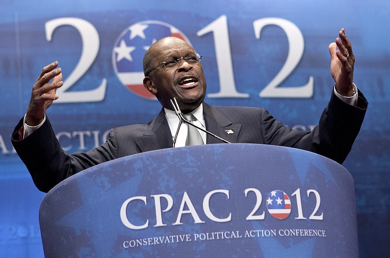 In this Feb. 9, 2012 file photo, former presidential candidate Herman Cain addresses the Conservative Political Action Conference in Washington. Cain has died after battling the coronavirus. A post on Cain's Twitter account on Thursday, July 30, 2020 announced the death. (AP Photo/J. Scott Applewhite, File)