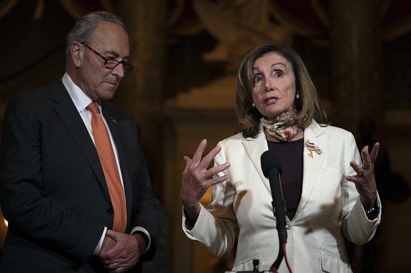 House Speaker Nancy Pelosi of Calif., and Senate Minority Leader Sen. Chuck Schumer of N.Y., speak to reporters on Capitol Hill in Washington, Thursday, Aug. 6, 2020. (AP Photo/Carolyn Kaster)


