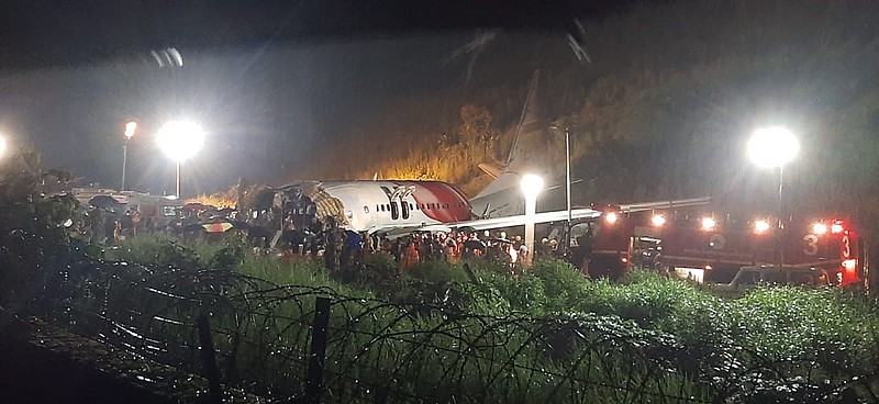 The Air India Express flight that skidded off a runway while landing at the airport in Kozhikode, Kerala state, India, Friday, Aug. 7, 2020. (AP Photo)