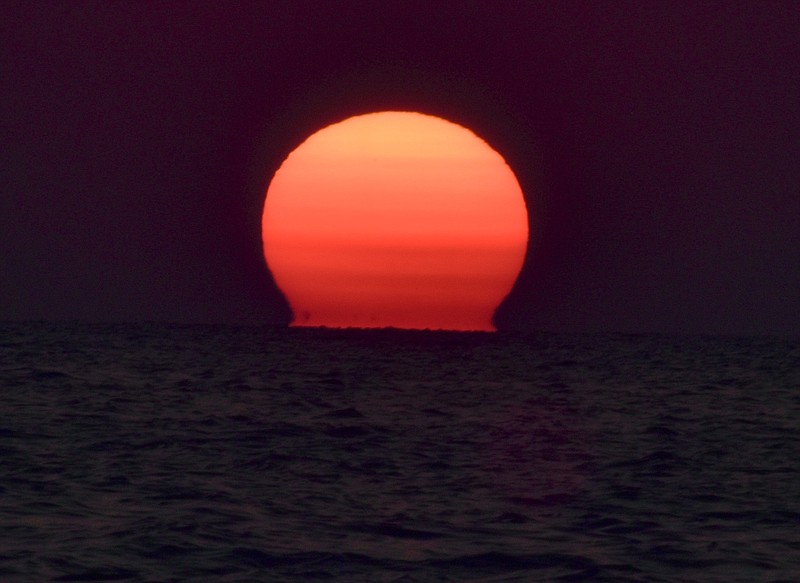 A sunset is seen at Cape San Blas, Florida, on August 6, 2020. / Staff photo by Jay Greeson