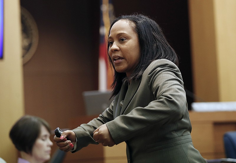 FILE - In this Wednesday, Aug. 24, 2016, file photo, Fulton County Deputy District Attorney Fani Willis makes her closing arguments during a trial in Atlanta. Fulton County District Attorney Paul Howard has run unopposed for two decades. But he came in second to his former longtime assistant Willis in the June Democratic primary and faces a tough runoff election Tuesday, Aug. 11, 2020. (AP Photo/John Bazemore, File)


