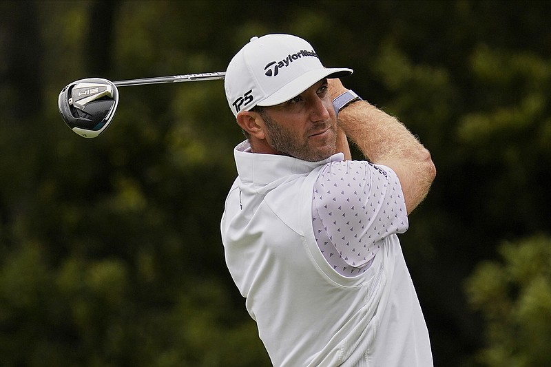 AP photo by Jeff Chiu / Dustin Johnson watches his tee shot on the 12th hole at TPC Harding Park during the third round of the PGA Championship on Saturday in San Francisco.