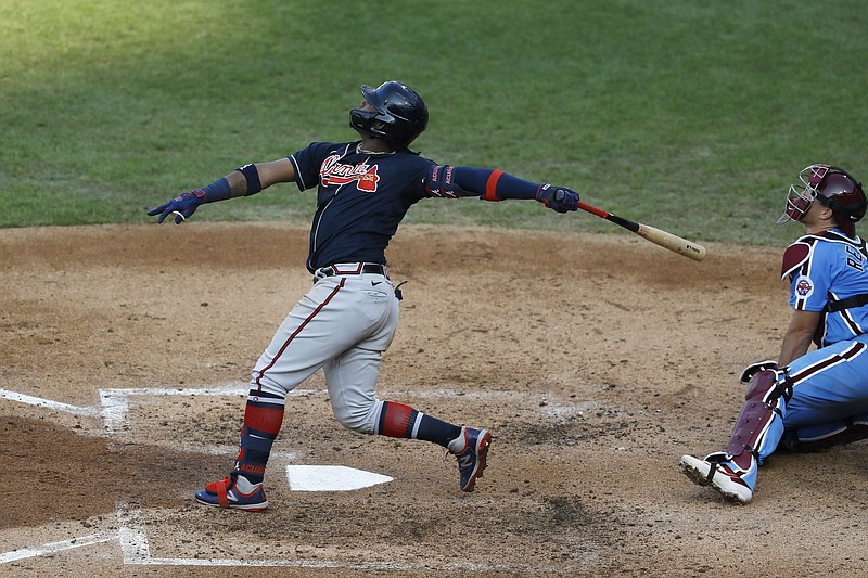 AP photo by Matt Slocum / Atlanta Braves outfielder Ronald Acuña Jr. follows through after hitting a home run off Philadelphia Phillies starter Spencer Howard during the fifth inning of the second game of a doubleheader between the NL East rivals Sunday in Philadelphia. Acuña had two homers in the game after hitting a two-run shot in the first contest.