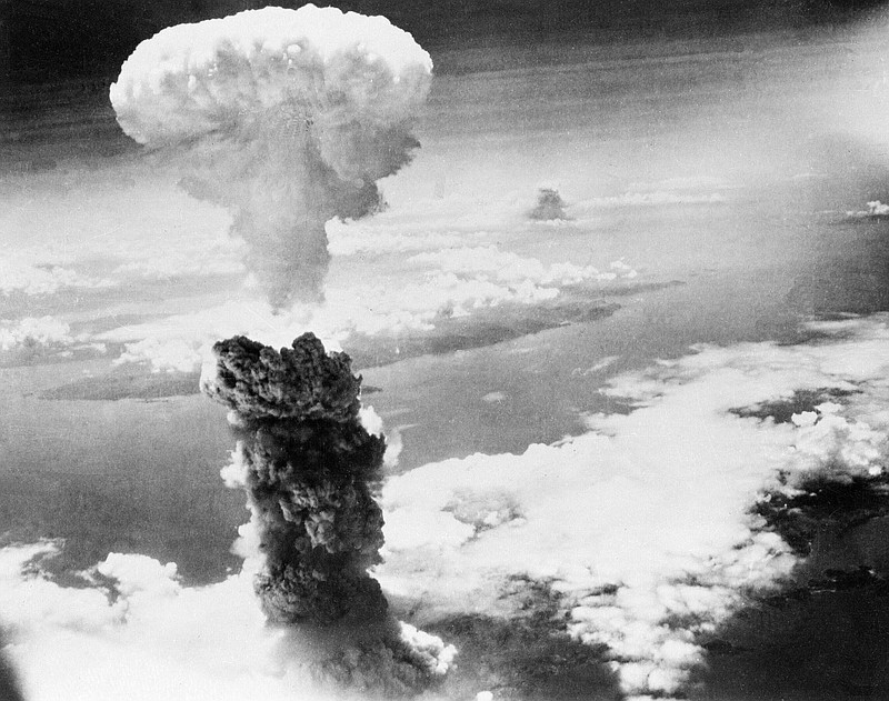 File photo from The Associated Press / In this Aug. 9, 1945, a giant column of smoke rises after the second atomic bomb ever used in warfare explodes over the Japanese port town of Nagasaki. Japan surrendered on Aug. 15, ending World War II and its nearly a half-century aggression toward Asian neighbors.