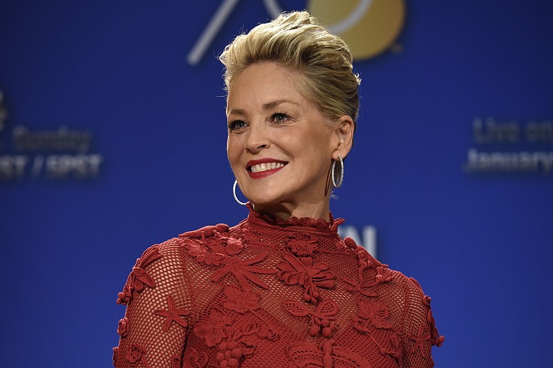 Sharon Stone poses during the nominations for the 75th Annual Golden Globe Awards on Dec. 11, 2017, in Beverly Hills, Calif. Stone has written a memoir her publisher is calling both candid and comprehensive. Alfred A. Knopf announced Tuesday that Stone's "The Beauty of Living Twice" will be released in March. (Photo by Chris Pizzello/Invision/AP, File)
