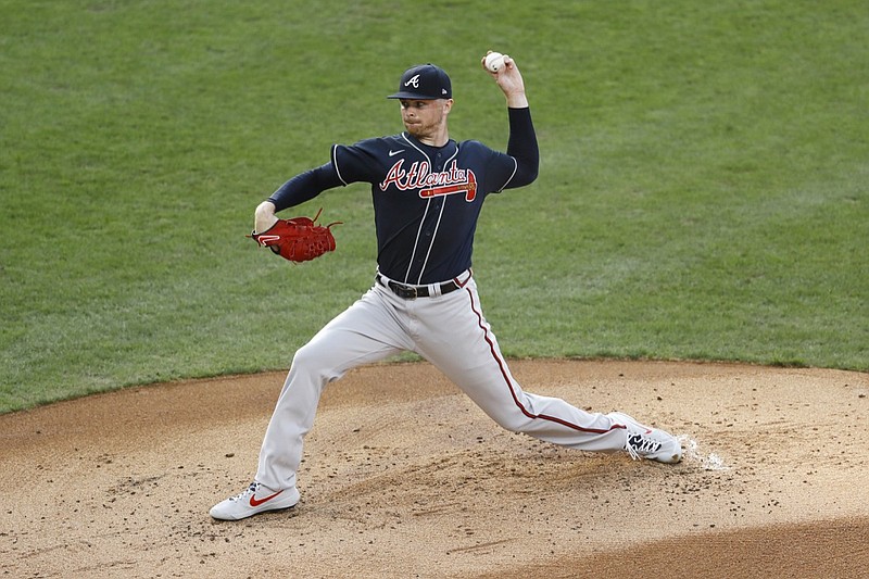 Atlanta Braves' Sean Newcomb pitches during the first inning of a baseball game against the Philadelphia Phillies, Monday, Aug. 10, 2020, in Philadelphia. (AP Photo/Matt Slocum)