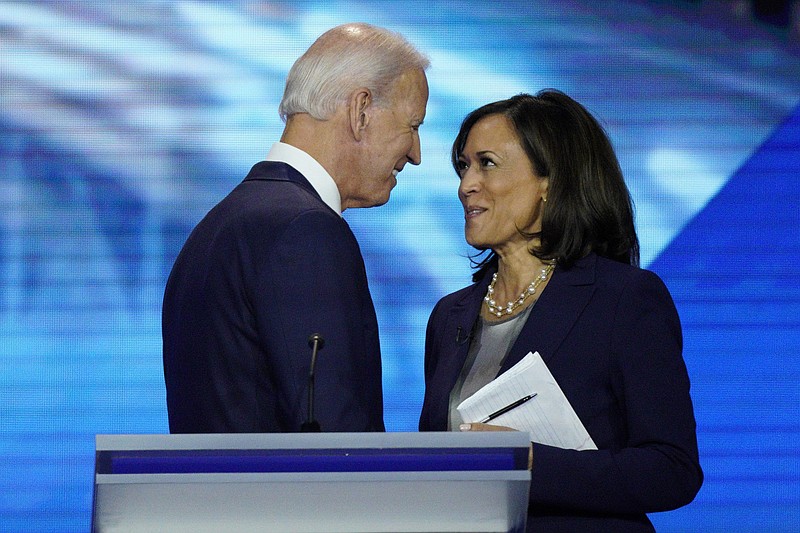 FILE - In this Sept. 12, 2019, file photo, Democratic presidential candidate former Vice President Joe Biden, left, and then-candidate Sen. Kamala Harris, D-Calif. shake hands after a Democratic presidential primary debate hosted by ABC at Texas Southern University in Houston. Biden has chosen Harris as his running mate. (AP Photo/David J. Phillip, File)


