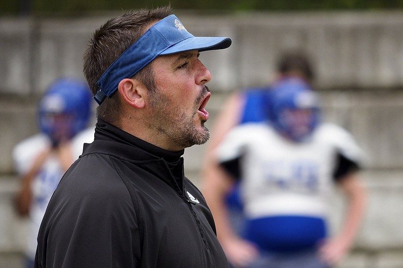 Staff photo by C.B. Schmelter / Red Bank football coach Chris Brown talks during practice Monday. Brown is 21-3 entering his third season leading the Lions, who hope to win their fourth Region 3-3A title in five years.