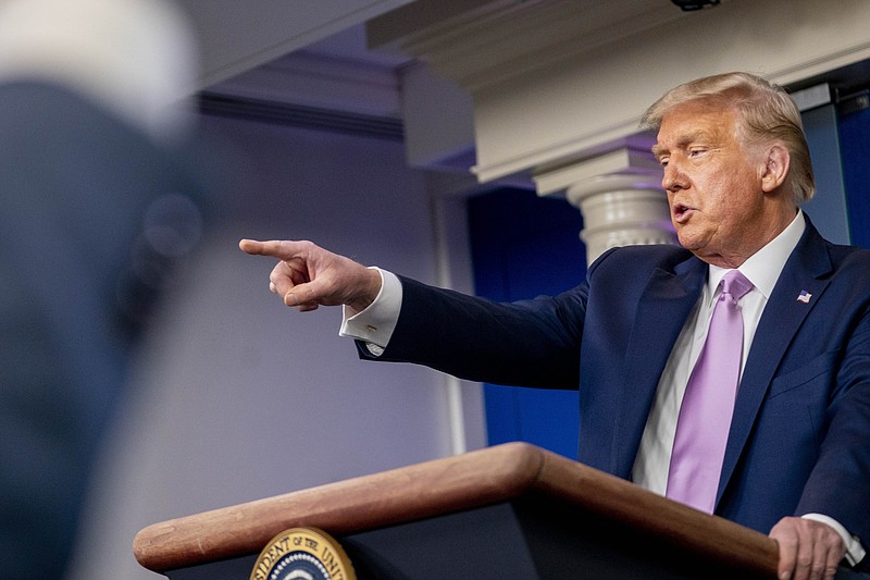 President Donald Trump calls on a reporter as he speaks at a news conference in the James Brady Press Briefing Room at the White House, Tuesday, Aug. 11, 2020, in Washington. (AP Photo/Andrew Harnik)