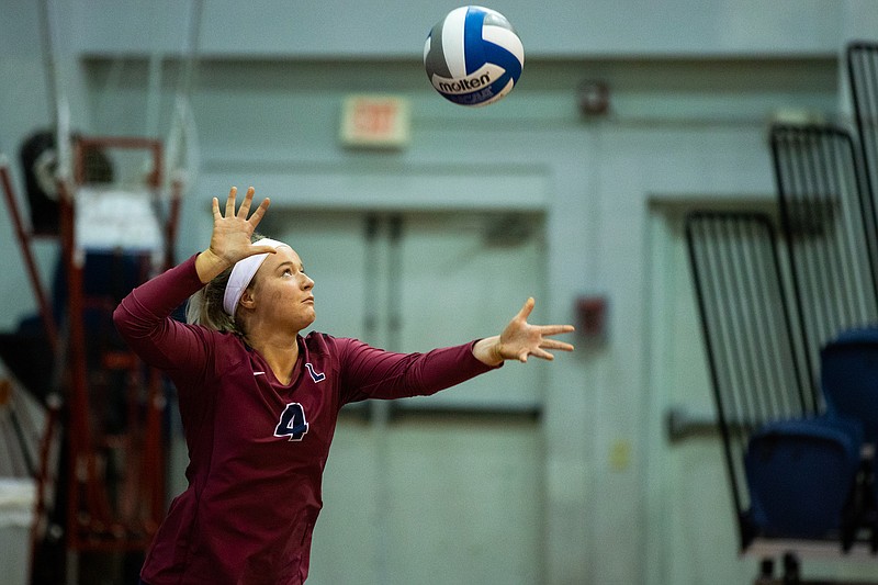 Lee University photo / Lee's Hannah Longley from Cleveland serves during a home volleyball match against Gulf South Conference opponent Auburn University at Montgomery on Oct. 26, 2019. The GSC has postponed competition for most sports during the 2020-21 school year's fall semester, including volleyball.