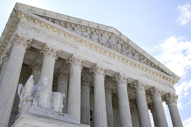 AP file photo, Manuel Balce Ceneta / This June 30, 2020, photo shows the U.S. Supreme Court in Washington. The court has been routinely turning back efforts to help voters during the COVID-19 pandemic.