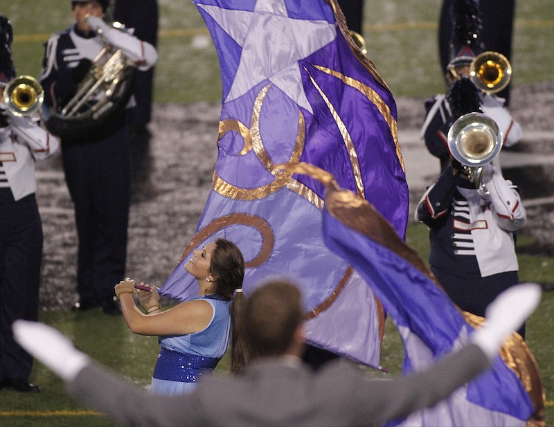 Staff file photo / The Heritage High School marching band performs their piece titled "The New World" before their prep football game against Ridgeland on Friday, Oct. 17, 2014, at Ridgeland High School in Rossville, Ga.