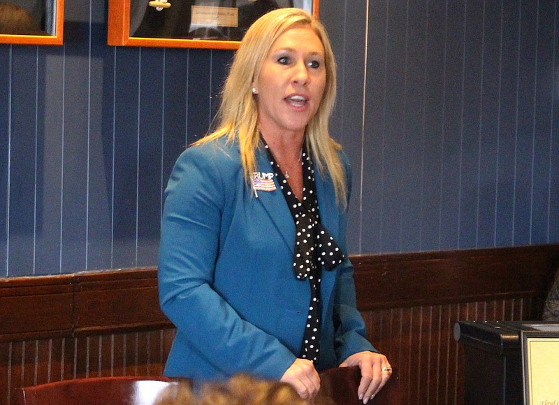 Photo by John Bailey of the Rome News-Tribune via The Associated Press / In this March 3, 2020 file photo, Republican Marjorie Taylor Greene speaks to a GOP women's group in Rome, Georgia.