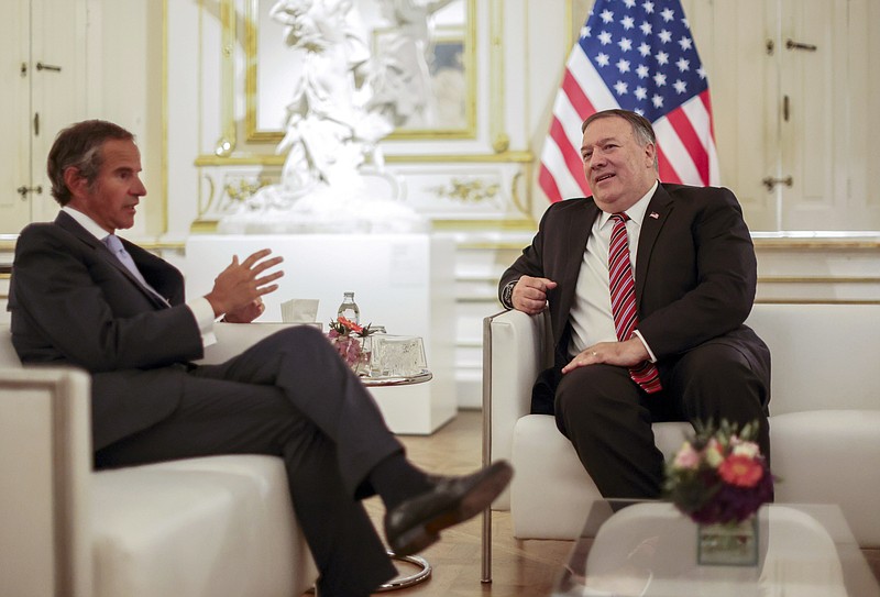 U.S. Secretary of State Mike Pompeo meets with International Atomic Energy Agency (IAEA) Director General Rafael Grossi in Vienna, Friday, Aug. 14, 2020. Pompeo is on a five day visit to central Europe. (Lisi Niesner/Pool Photo via AP)