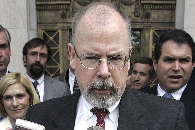 In this April 25, 2006 file photo, U.S. Attorney John Durham speaks to reporters on the steps of U.S. District Court in New Haven, Conn. Former FBI lawyer Kevin Clinesmith will plead guilty to making a false statement in the first criminal case arising from U.S. Attorney John Durham's investigation into the probe of ties between Russia and the 2016 Trump campaign. (AP Photo/Bob Child, File)