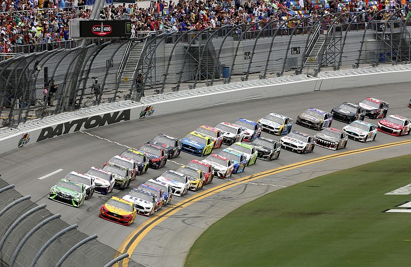 AP photo by David Graham / Kyle Busch, front left, and Joey Logano lead the field to start the 2019 Daytona 500. NASCAR is back at Daytona International Speedway this weekend with races for all three of its national series, but instead of using the traditional tri-oval, drivers are being challenged by the road course that uses a large part of the main track.