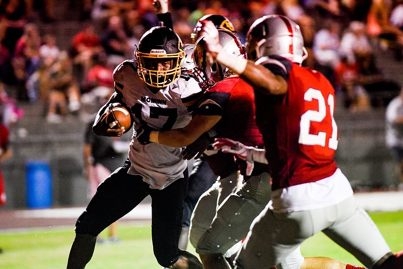 File photo by Cade Deakin / McMinn County running back Jalen Hunt, with ball, will try to add to his program career rushing yardage record in his final season with the Cherokees of Region 2-6A.