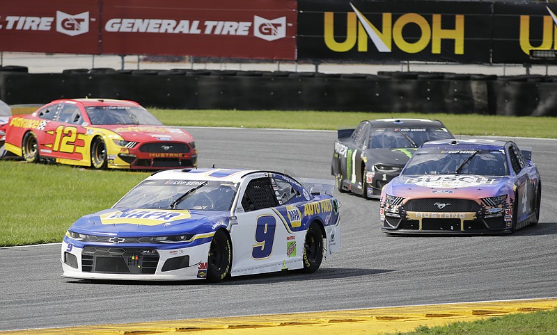 AP photo by Terry Renna / Chase Elliott (9) leads Kevin Harvick, Kurt Busch and Ryan Blaney through a turn on the road course at Daytona International Speedway during Sunday's NASCAR Cup Series race in Daytona Beach, Fla. Elliott won the race, holding off a late charge from Denny Hamlin.
