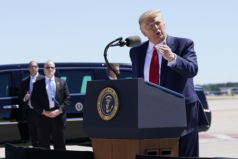President Donald Trump speaks to a crowd of supporters at Minneapolis-Saint Paul International Airport, Monday, Aug. 17, 2020, in Minneapolis. (AP Photo/Evan Vucci)
